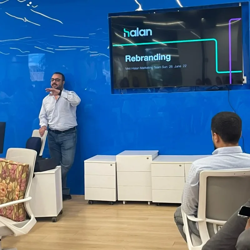 Mohamed Younis presenting the Halan rebranding strategy to the MNT-Halan marketing team, June 2022